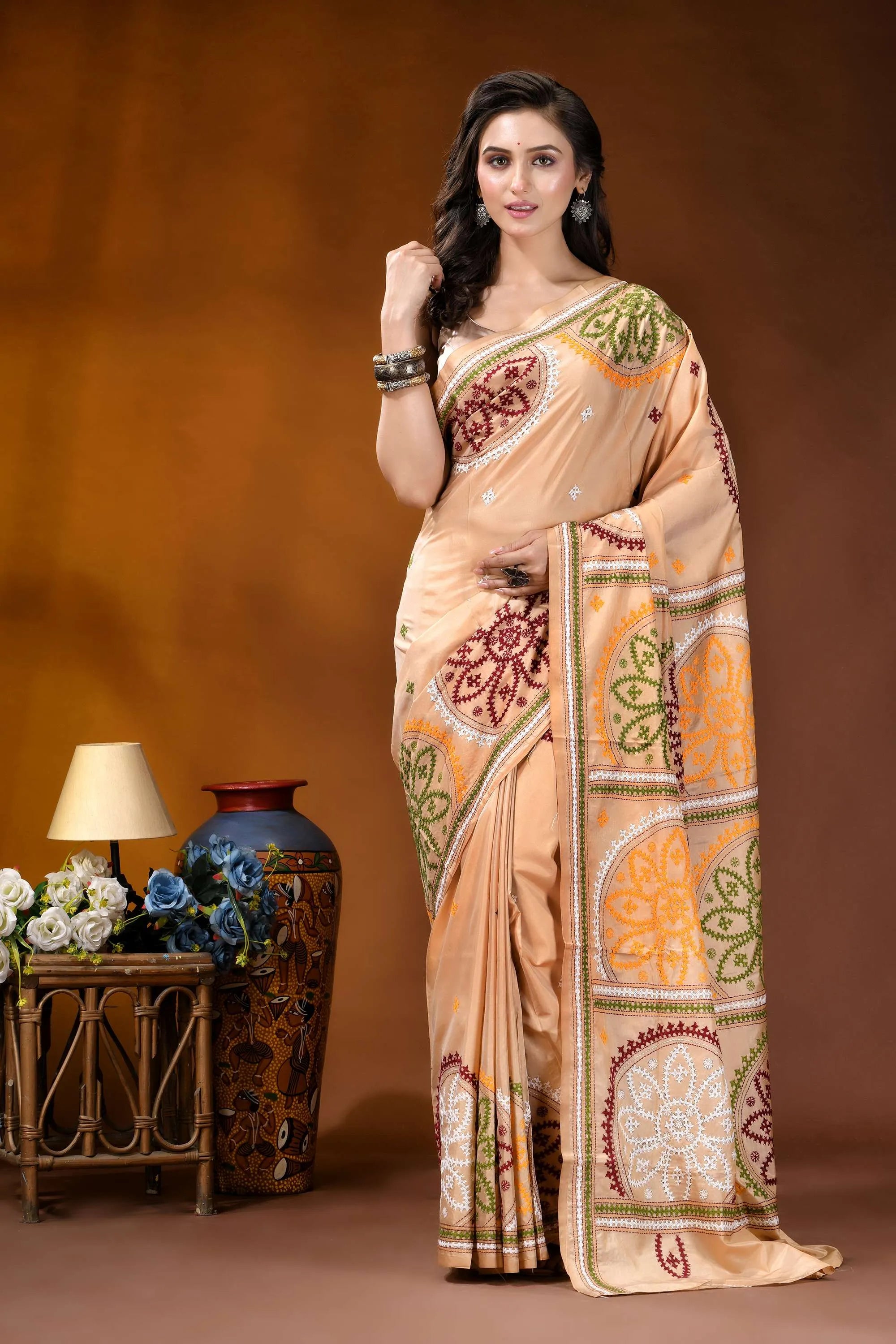 Beige multi-thread floral motif kutch embroidery silk saree woman wears beige silk saree 6