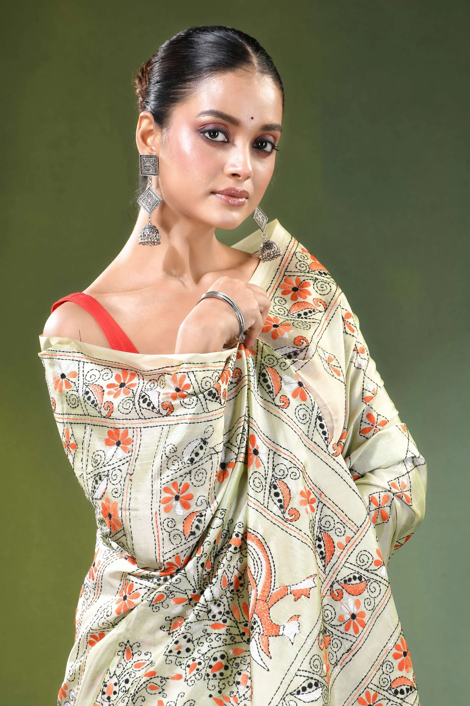 Beryl green peacock design handcrafted silk kantha saree woman wears cream-colored 2