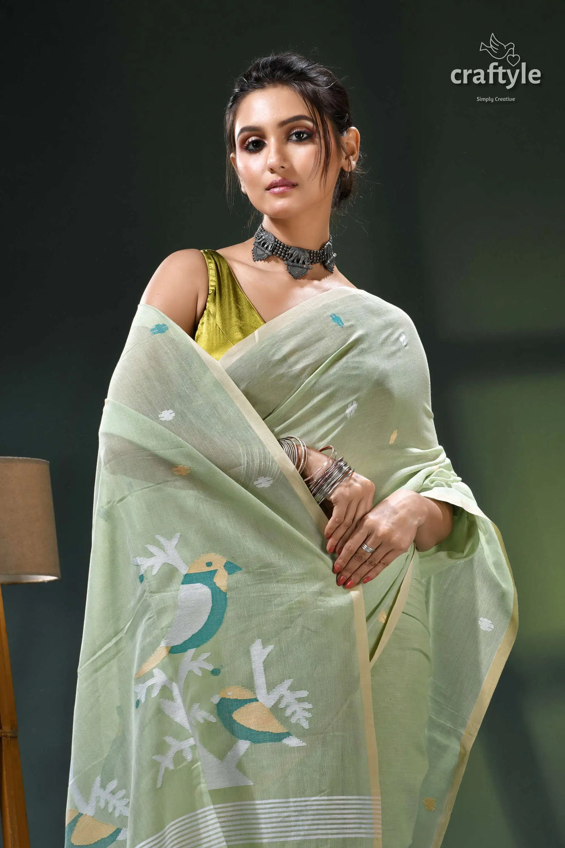 Bird motif handwoven soft cotton jamdani saree in laurel green pale green saree peacock design 2