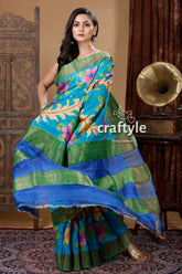 Blue hand painted zari tussar silk saree with floral motif - pure elegance woman blue green floral saree 3