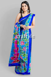 Blue lotus motif ma durga painted hand batik pure mulberry silk sare blue floral-patterned saree 1