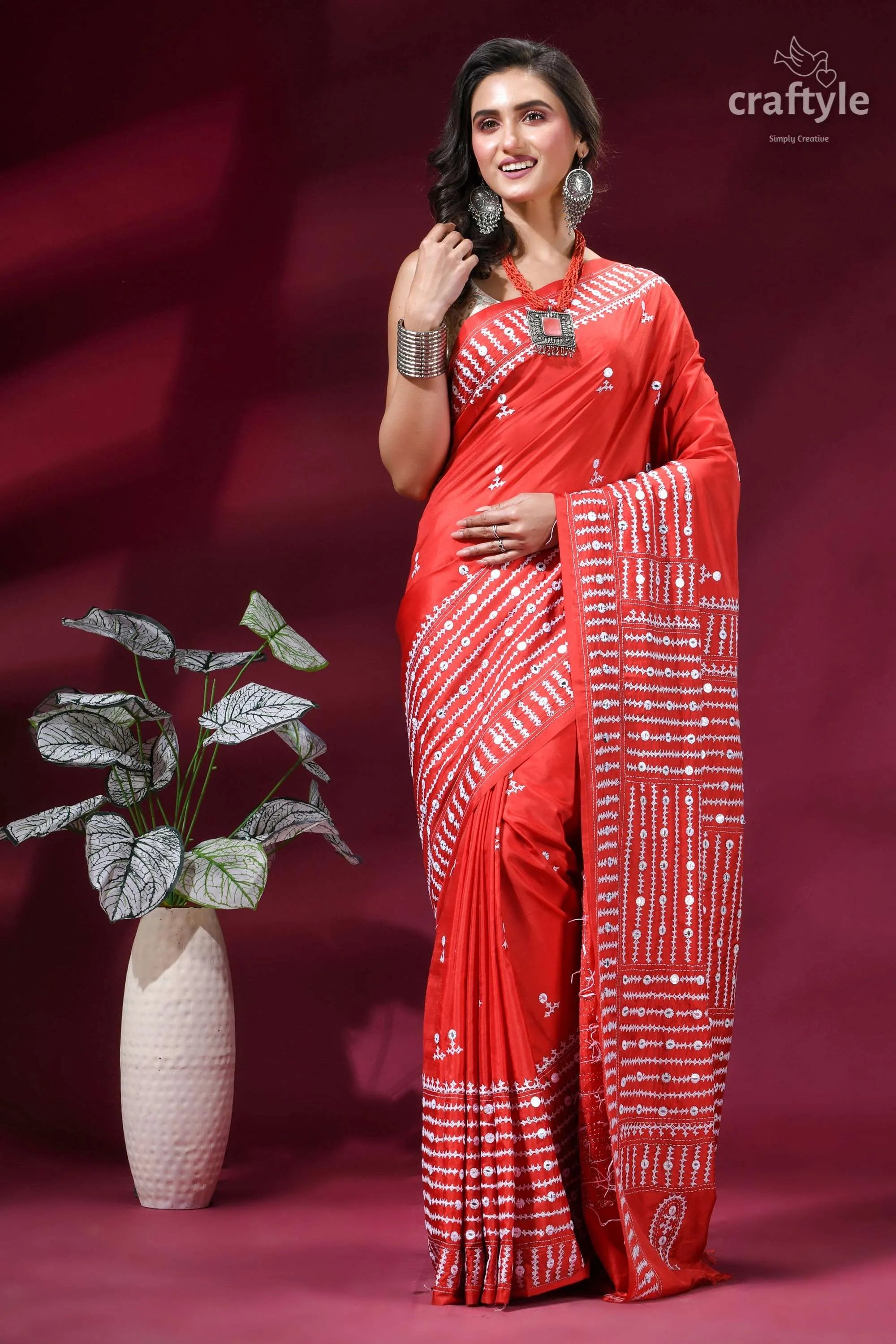 Brick red intricate gujrati stitched silk saree with mirror work vibrant red saree adorned intricate 5