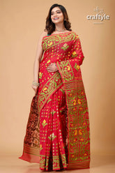 Bright maroon and green jamdani weave saree red embroidered saree 4