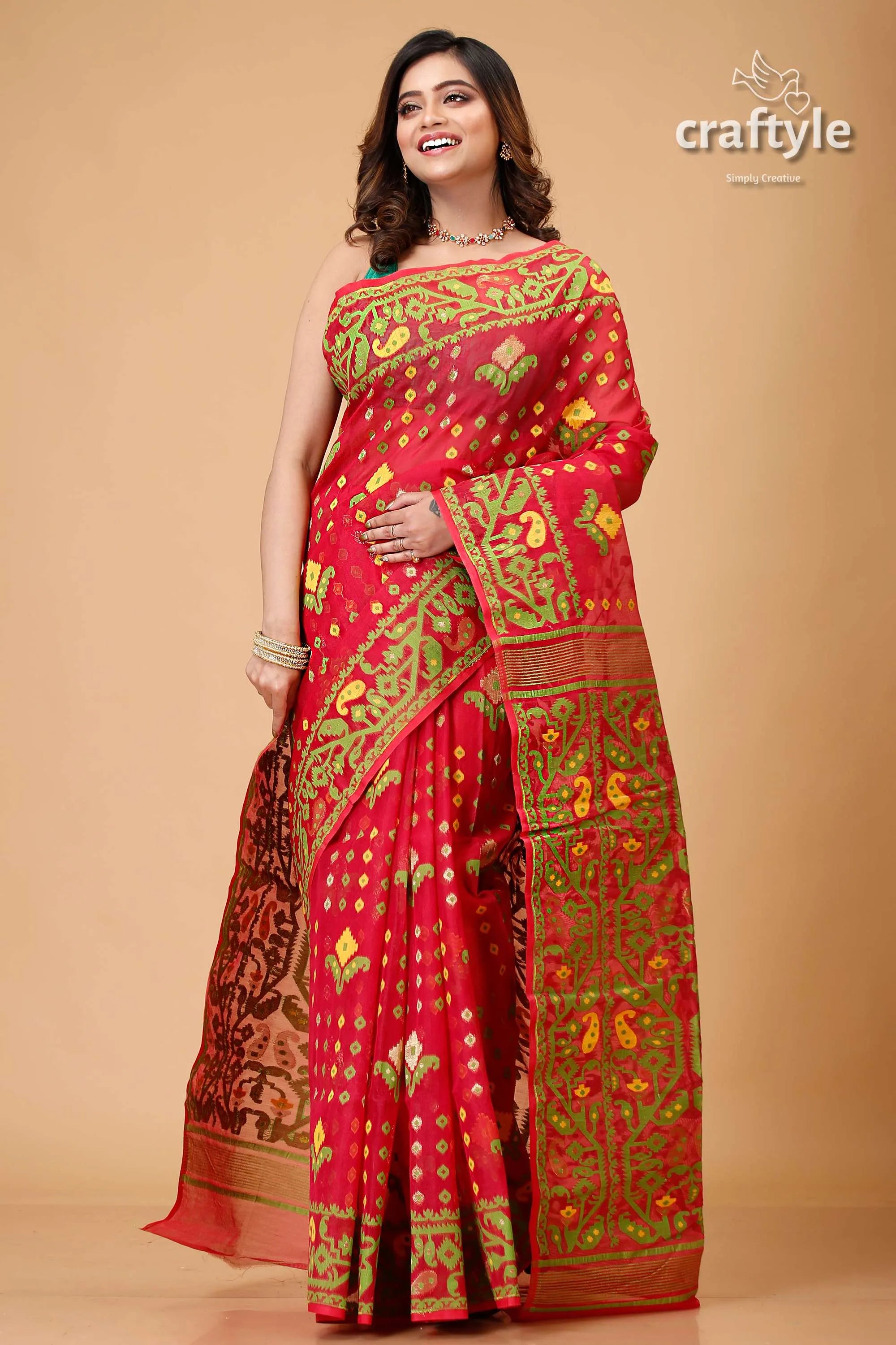 Bright maroon and green jamdani weave saree red embroidered 4