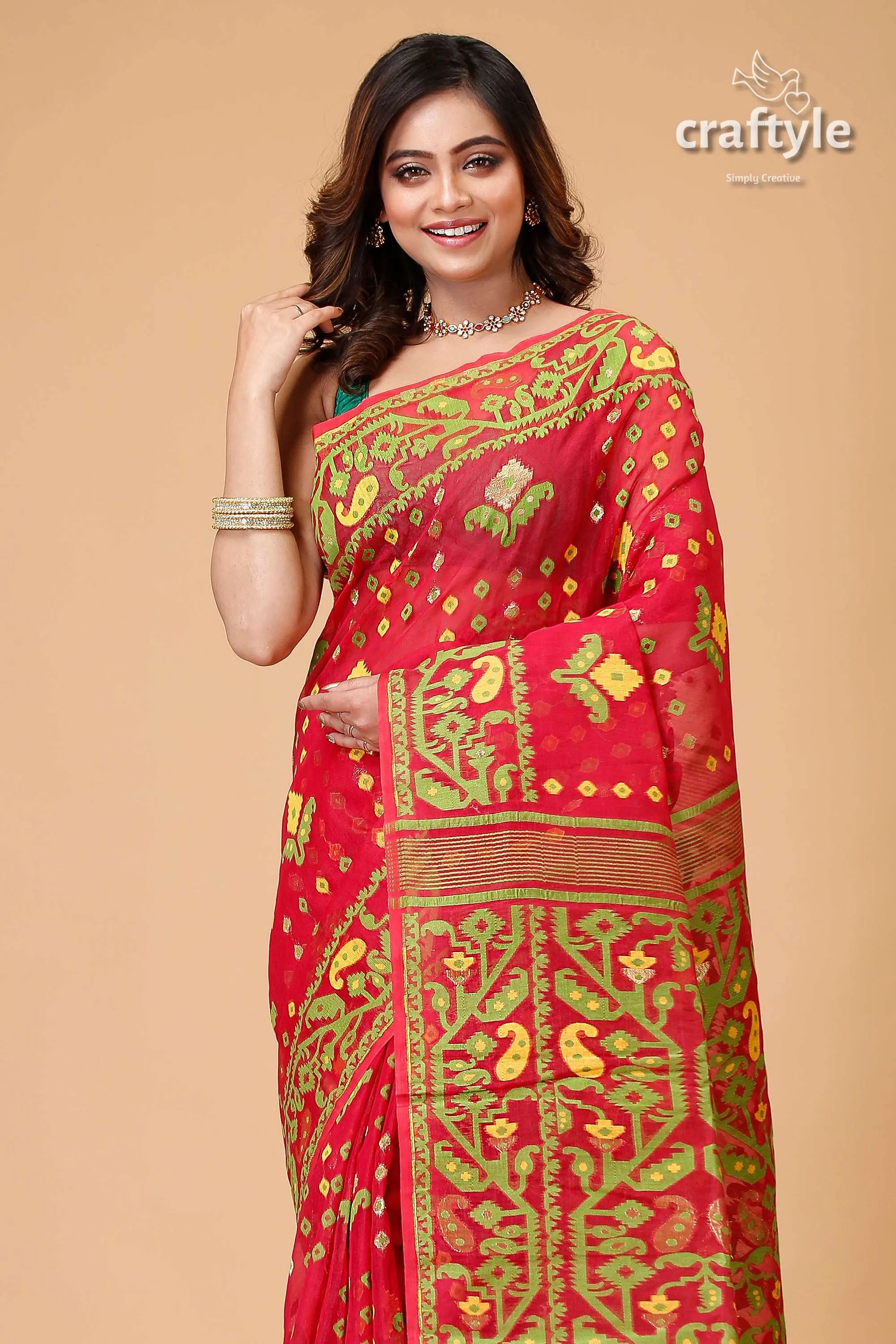Bright maroon and green jamdani weave saree red patterned 2
