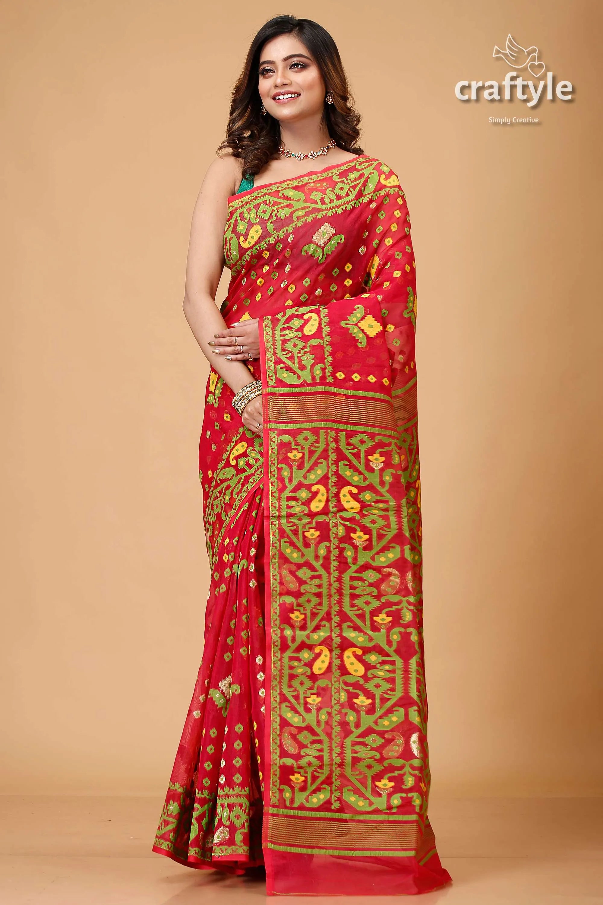Bright maroon and green jamdani weave saree red patterned 1