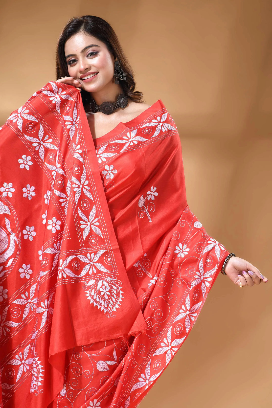 Bright red handmade swan motif floral silk kantha work saree vibrant red saree adorned intricate 2