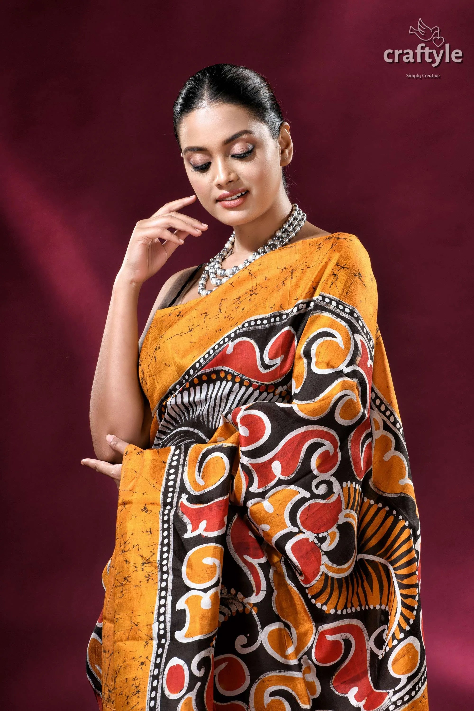 Carrot orange and black hand-painted wax batik pure mulberry silk saree vibrant orange saree bold black 2