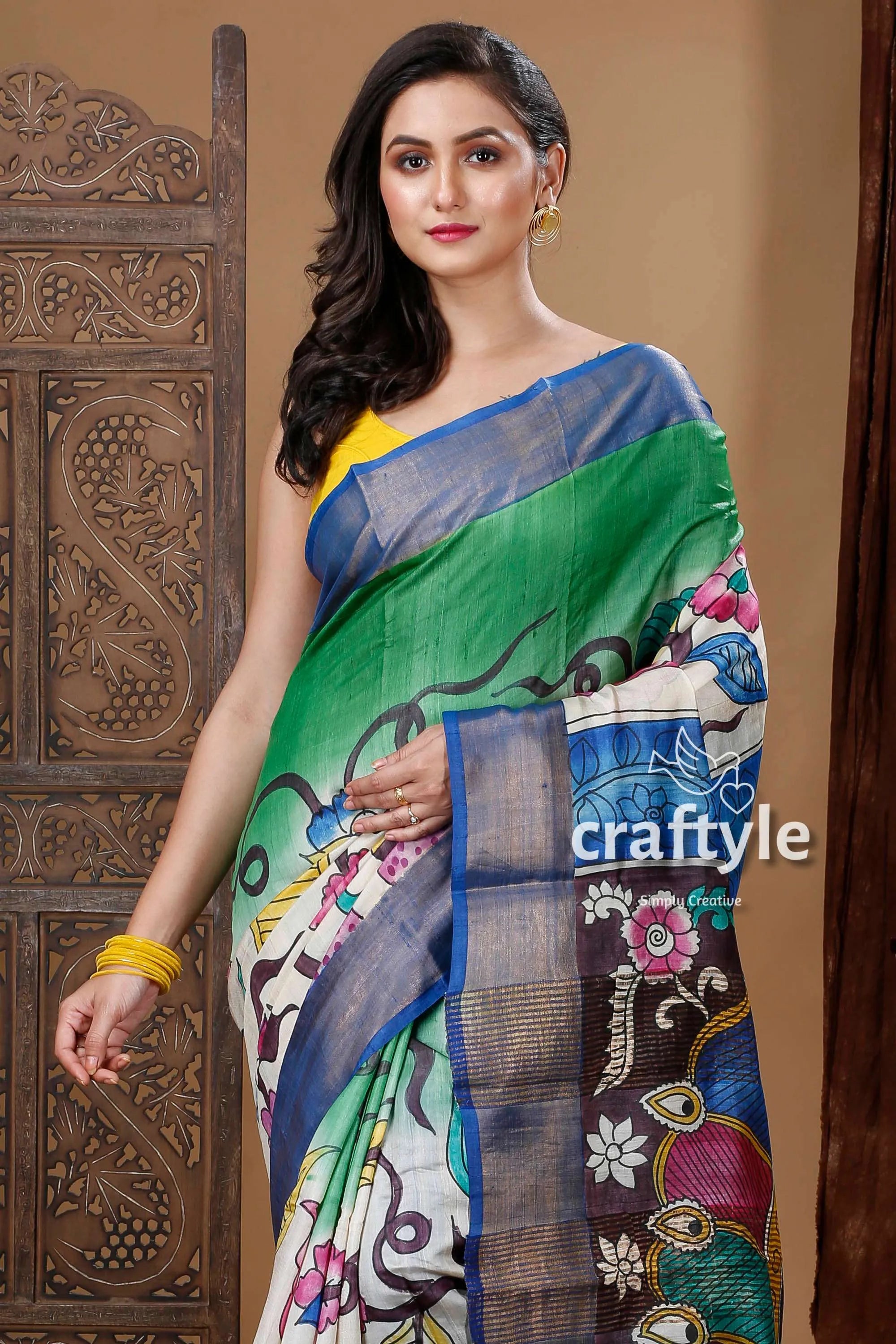 Classic peacock motif handmade zari pure tussar kalamkari saree green white hand-painted 2