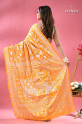 Corn yellow artisanal silk kantha saree bullock cart design woman bright orange sari white 4