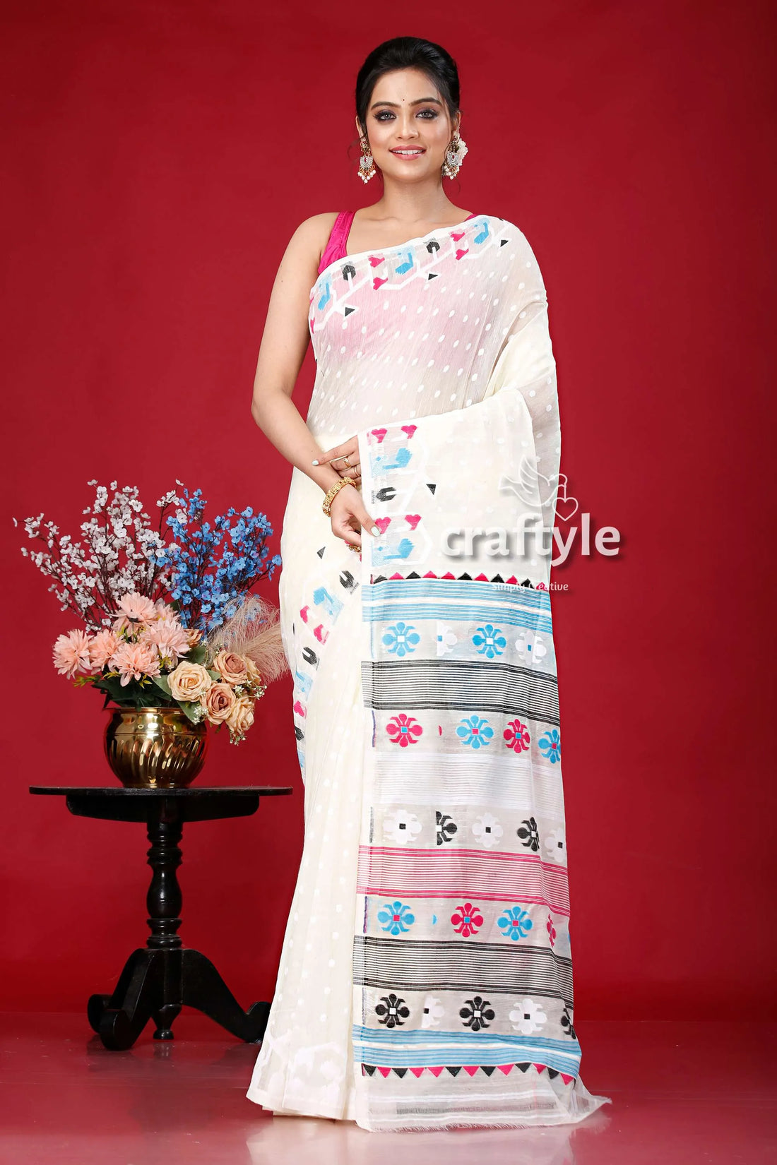 Cream white multicolor intricate jamdani saree woman colorful patterns 1