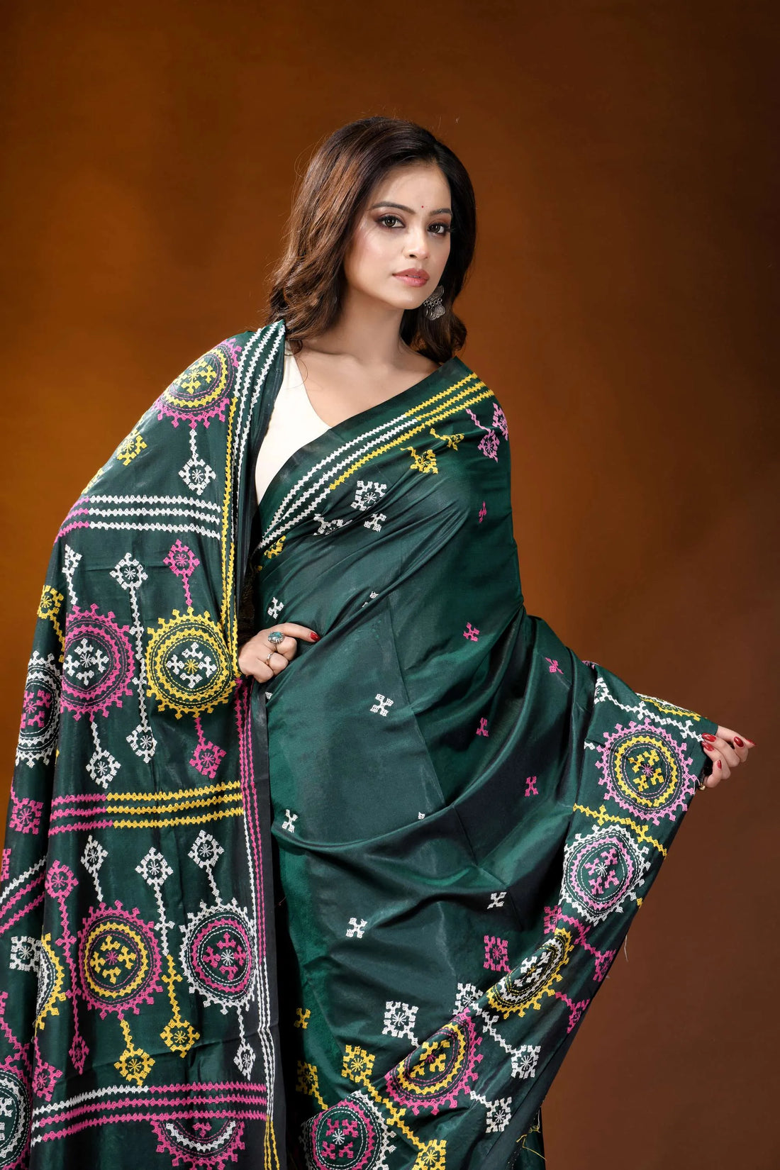 Dark green multicolor floral motif handcrafted gujrati stitch silk saree dark green silk saree adorned 2