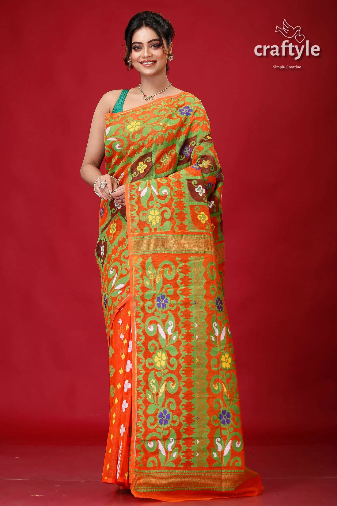 Deep carrot orange premium jamdani saree green floral patterned 1