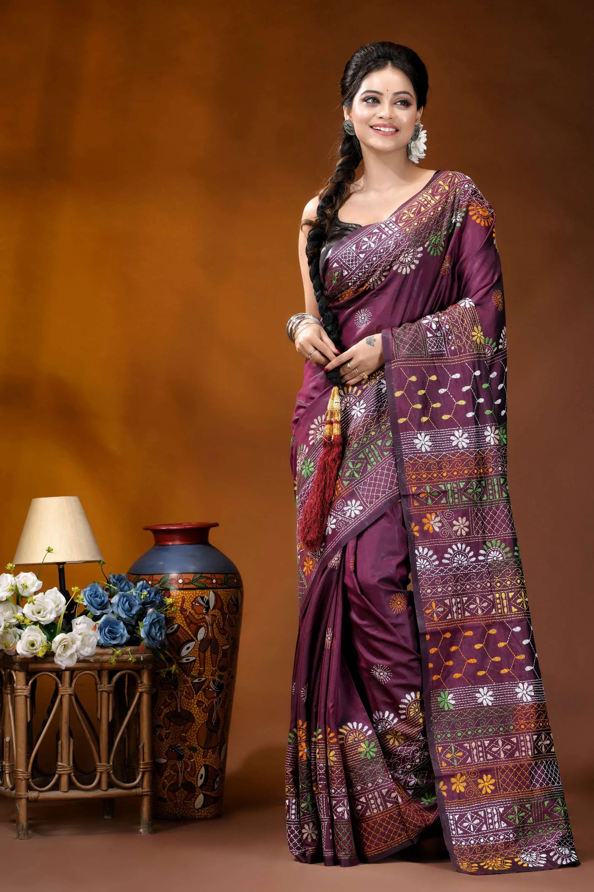 Deep plum multi-thread floral handcrafted silk lambani embroidery saree woman wears rich maroon silk 6
