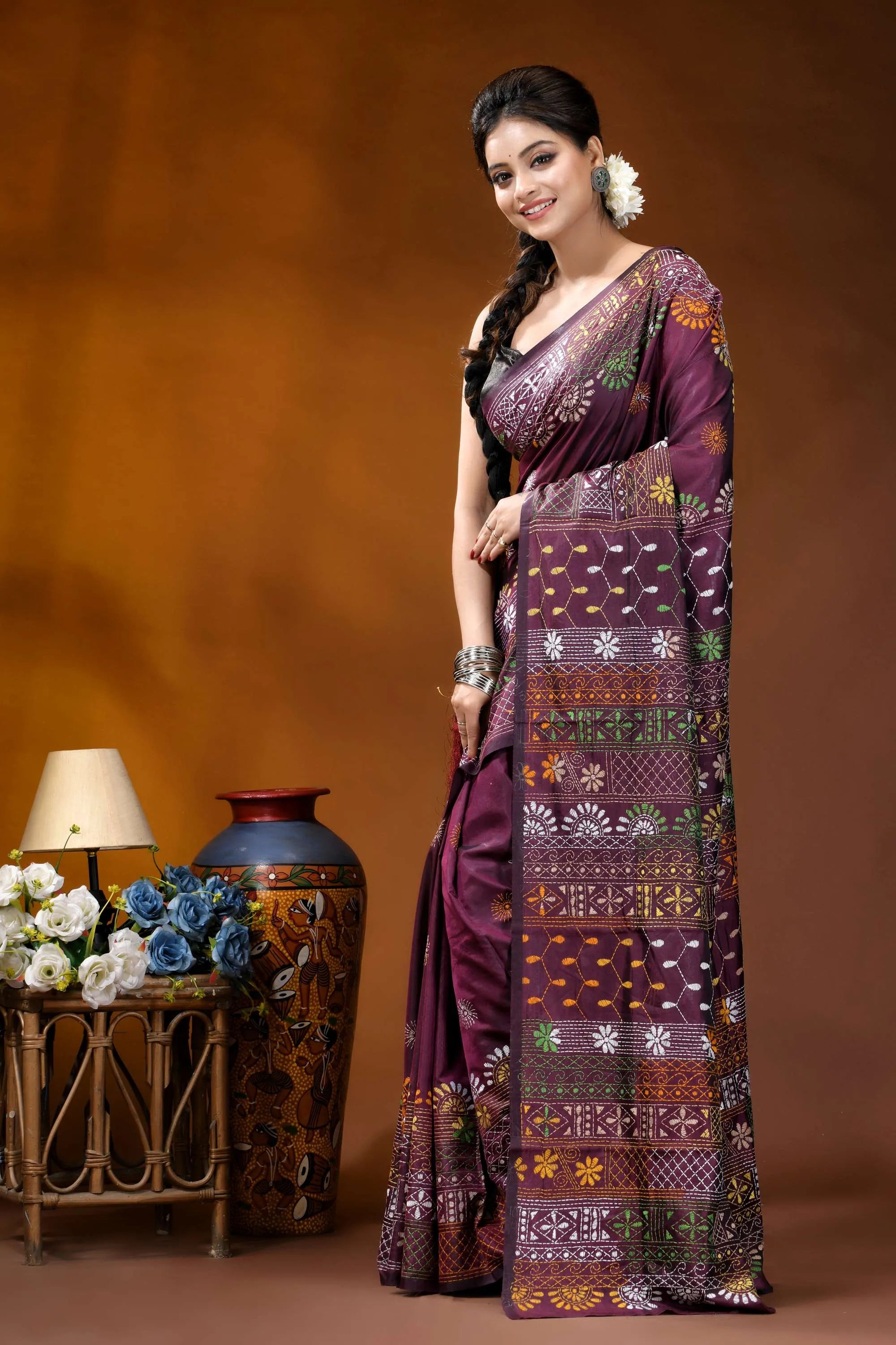 Deep plum multi-thread floral handcrafted silk lambani embroidery saree woman wears richly patterned purple 3