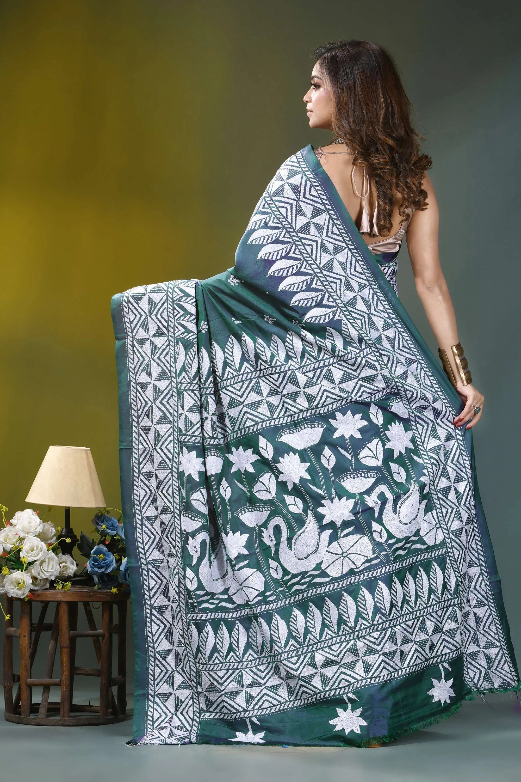Deep teal swan design kantha embroidery silk saree woman wears dark green white 5