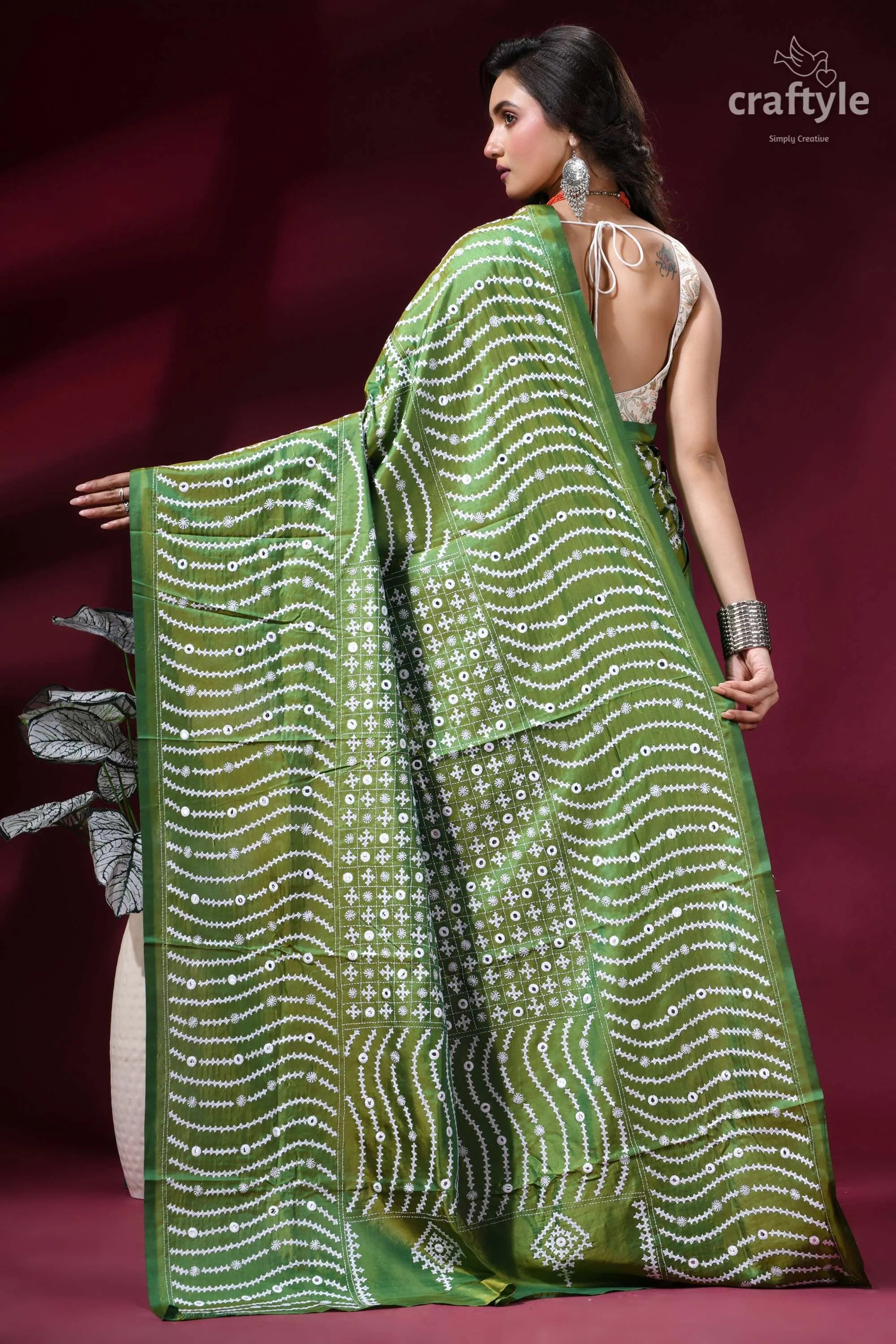 Drab green intricate gujrati stitch silk saree with mirror work green saree intricate white geometric 5