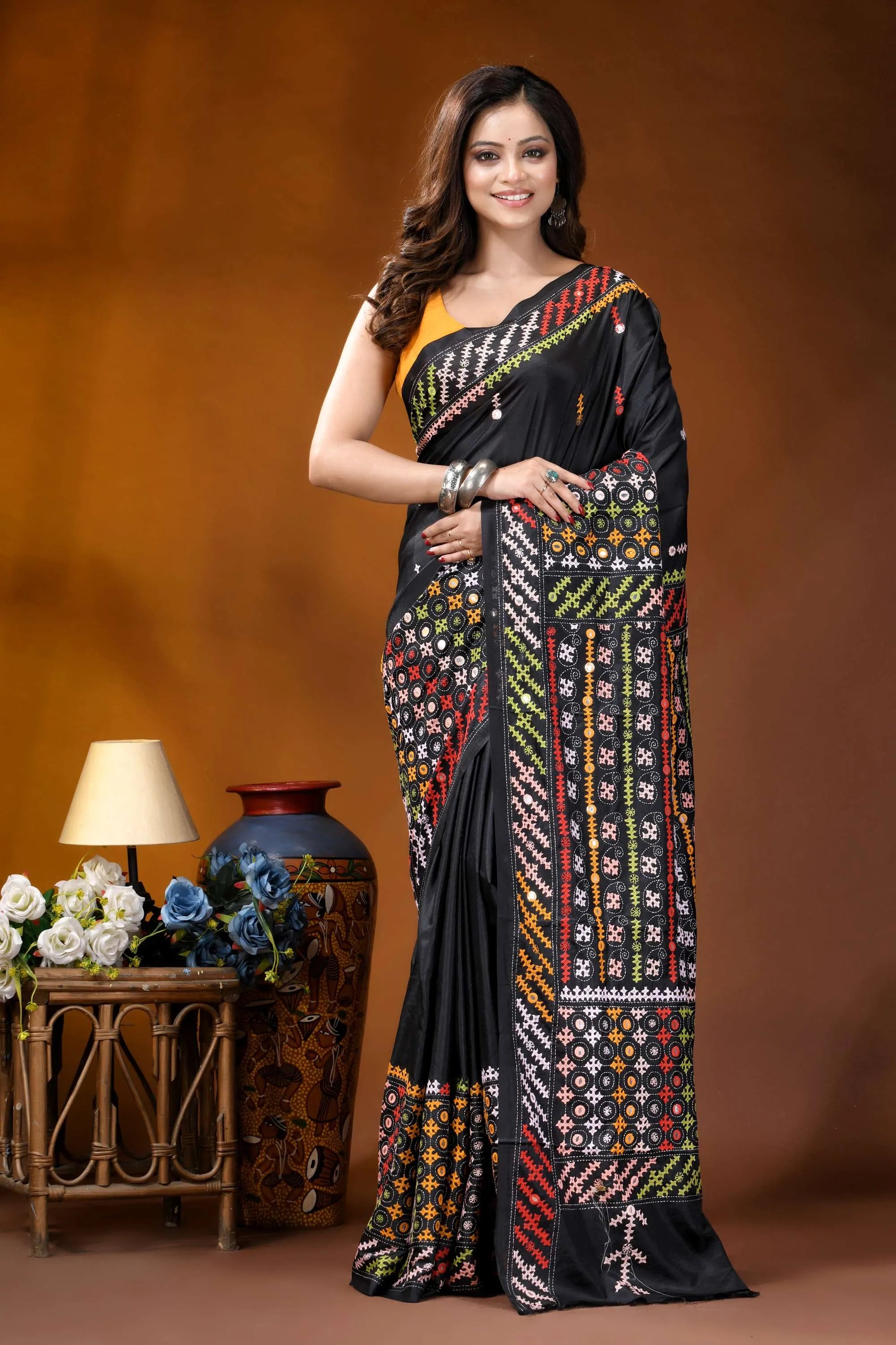 Ebony black multicolor hand-stitched kutch work silk saree with mirror detailing black saree intricate multicolored