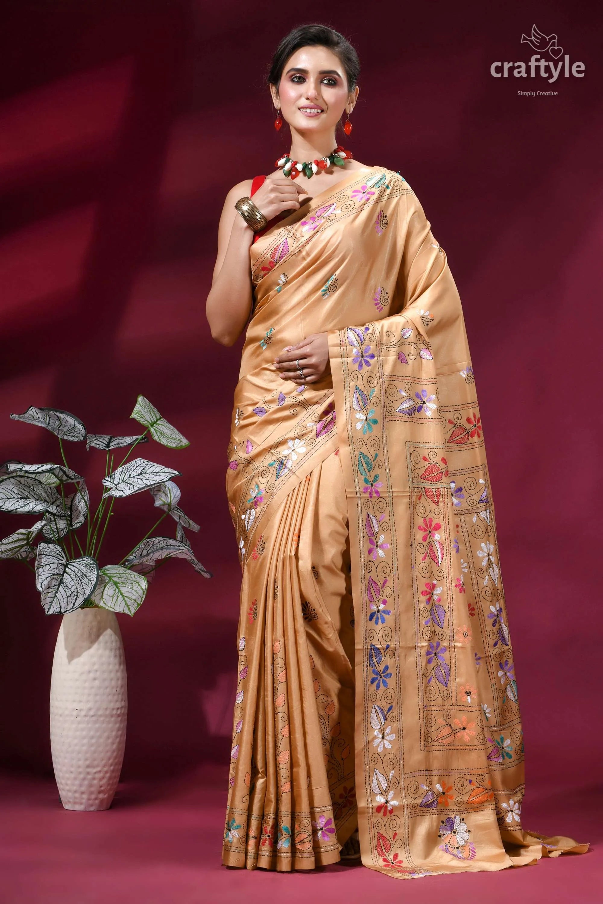Ethnic silk kantha stitch saree in desert sand woman wears golden-brown silk saree 6