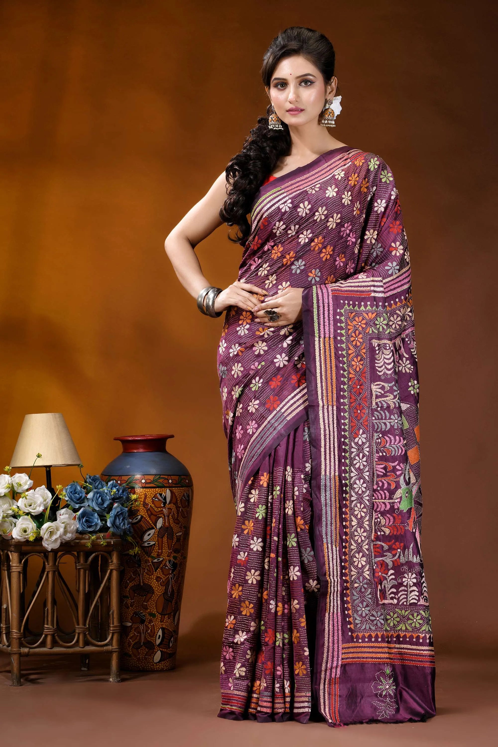 Exclusive bullock cart design handcrafted wine silk kantha stitch saree woman wears richly patterned purple 1