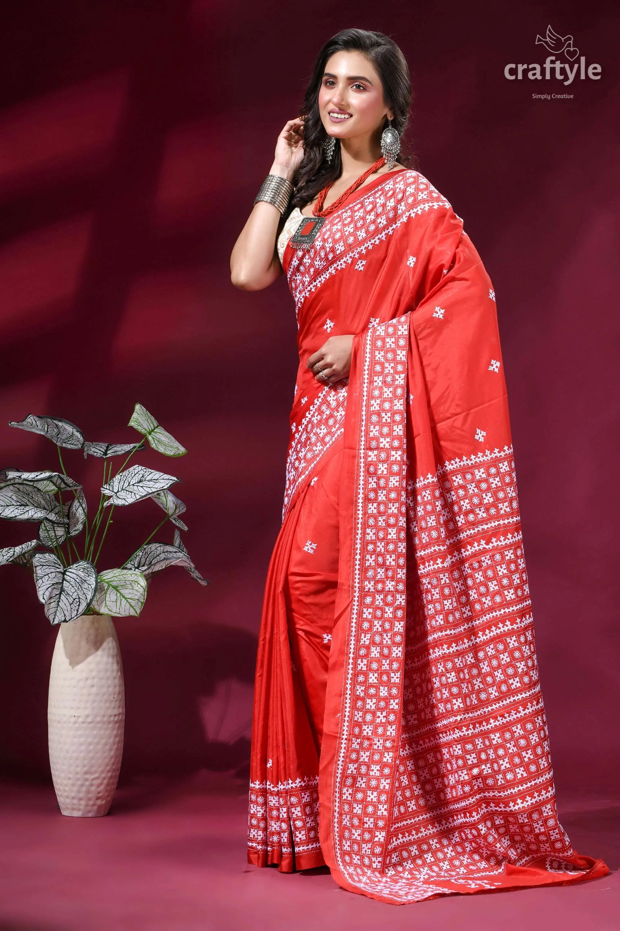 Exquisite red silk saree with white thread kutch embroidery vibrant red saree intricate white 3