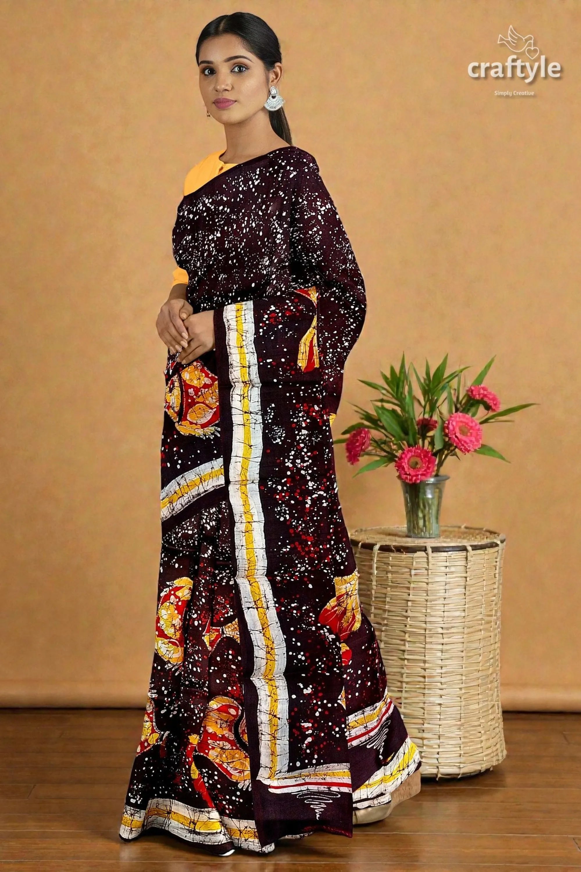 Fish motif hand batik pure mulberry silk saree - woman wears dark maroon saree 2