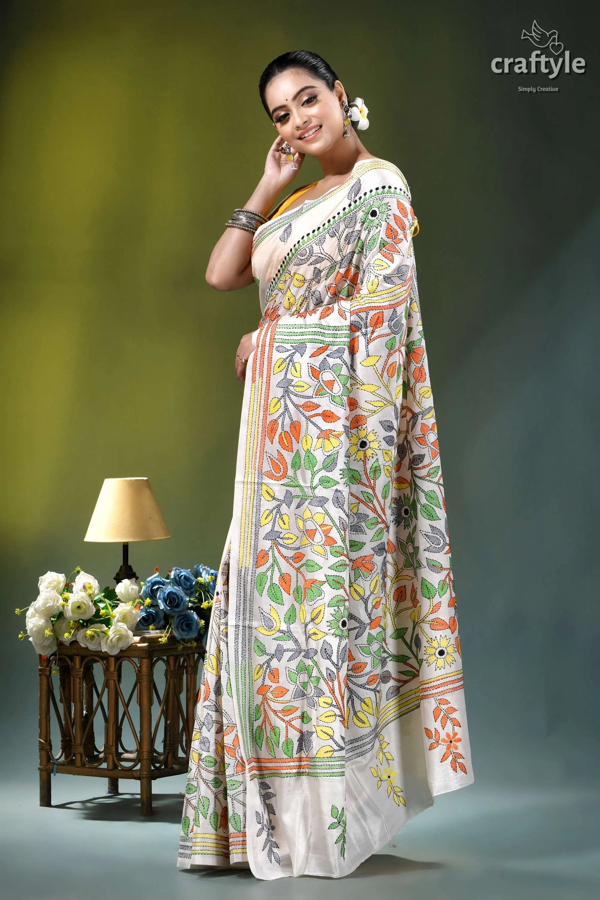 Floral white multicolor thread silk kantha stitch saree woman wears cream-colored saree intricate 3