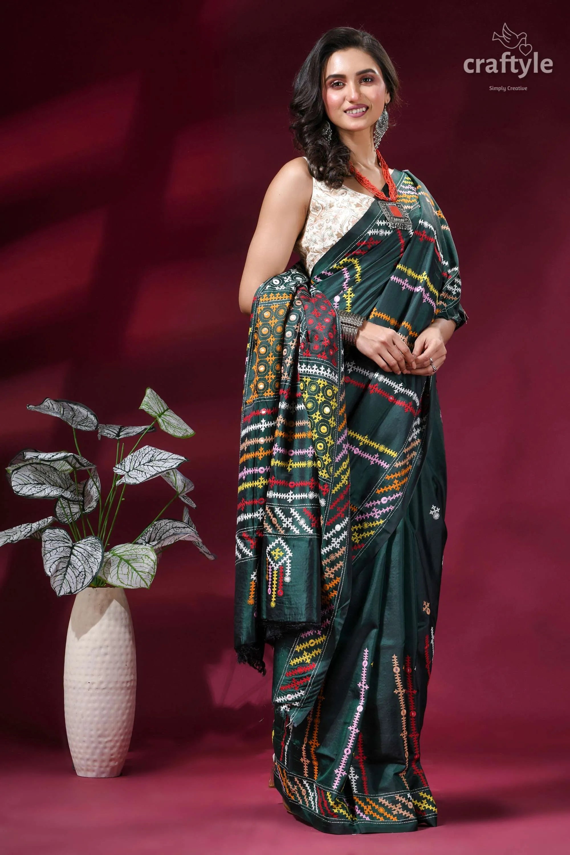 Gable green multi-thread gujrati stitch silk saree with mirror work dark green silk saree intricate 4