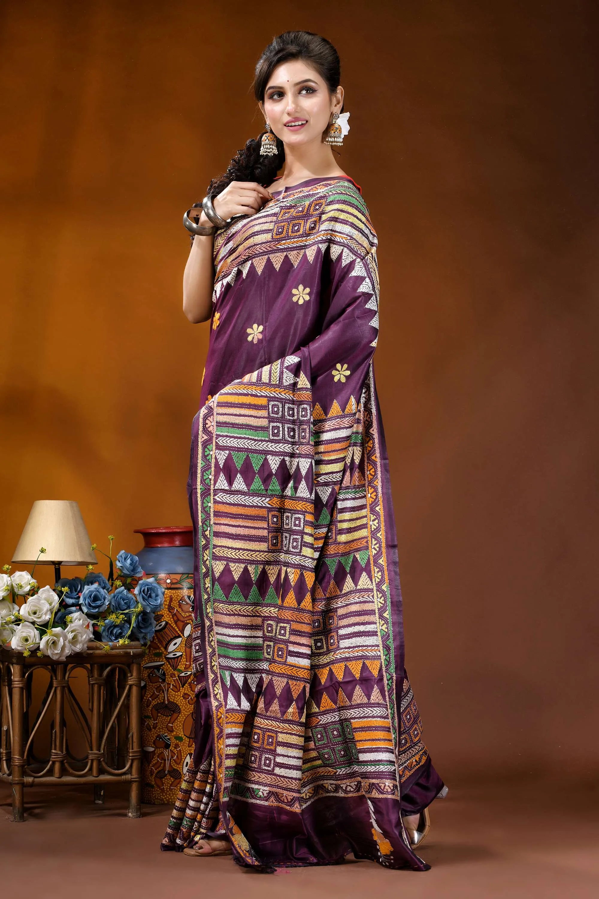 Grape purple ethnic design handcrafted silk kantha stitch saree woman wears vibrant purple saree 5