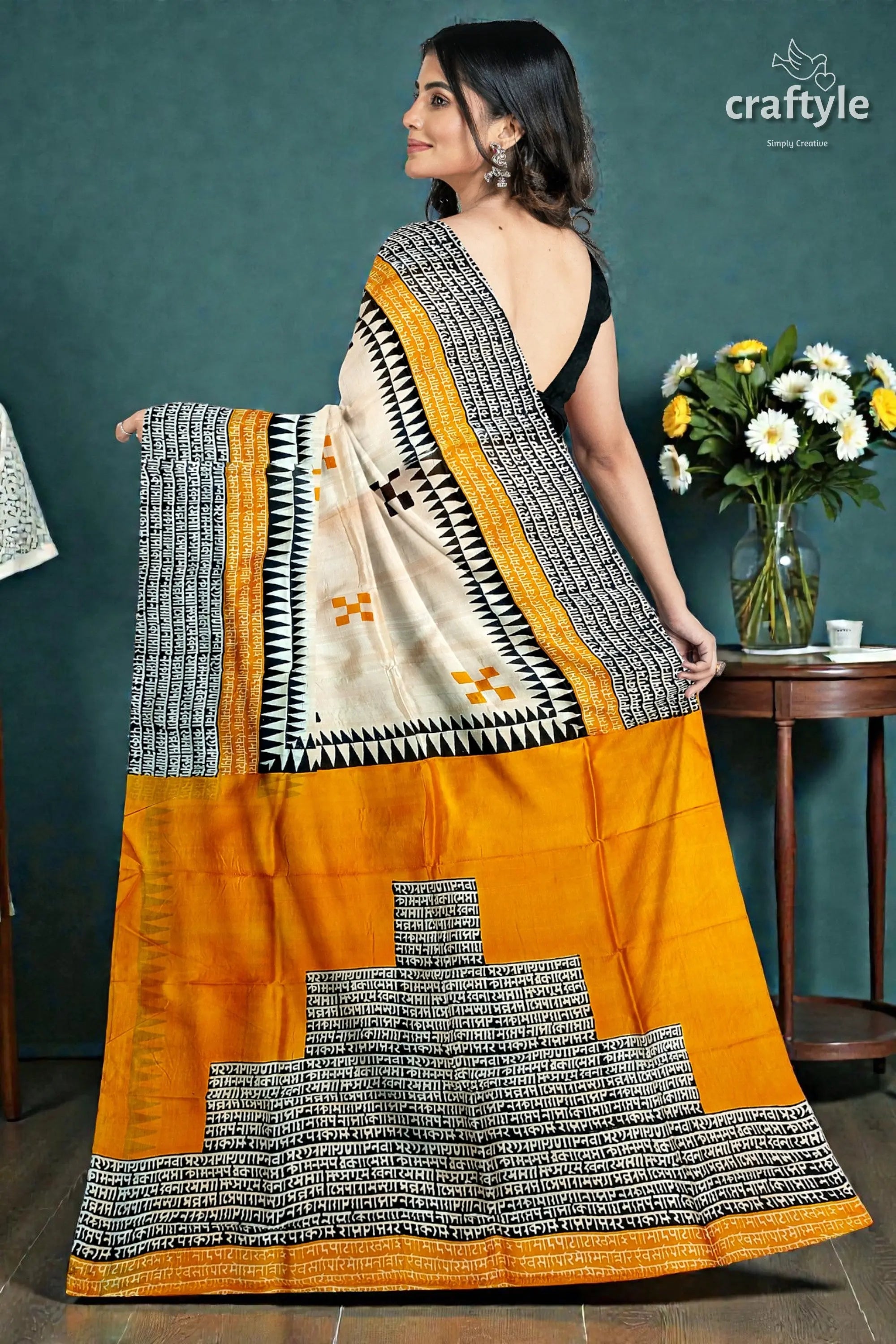 Hand block print mulberry pure silk saree - saffron yellow with black design 5