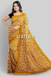 Hand block printed pure mulberry silk saree in sand yellow with butterfly motif woman mustard-colored saree white