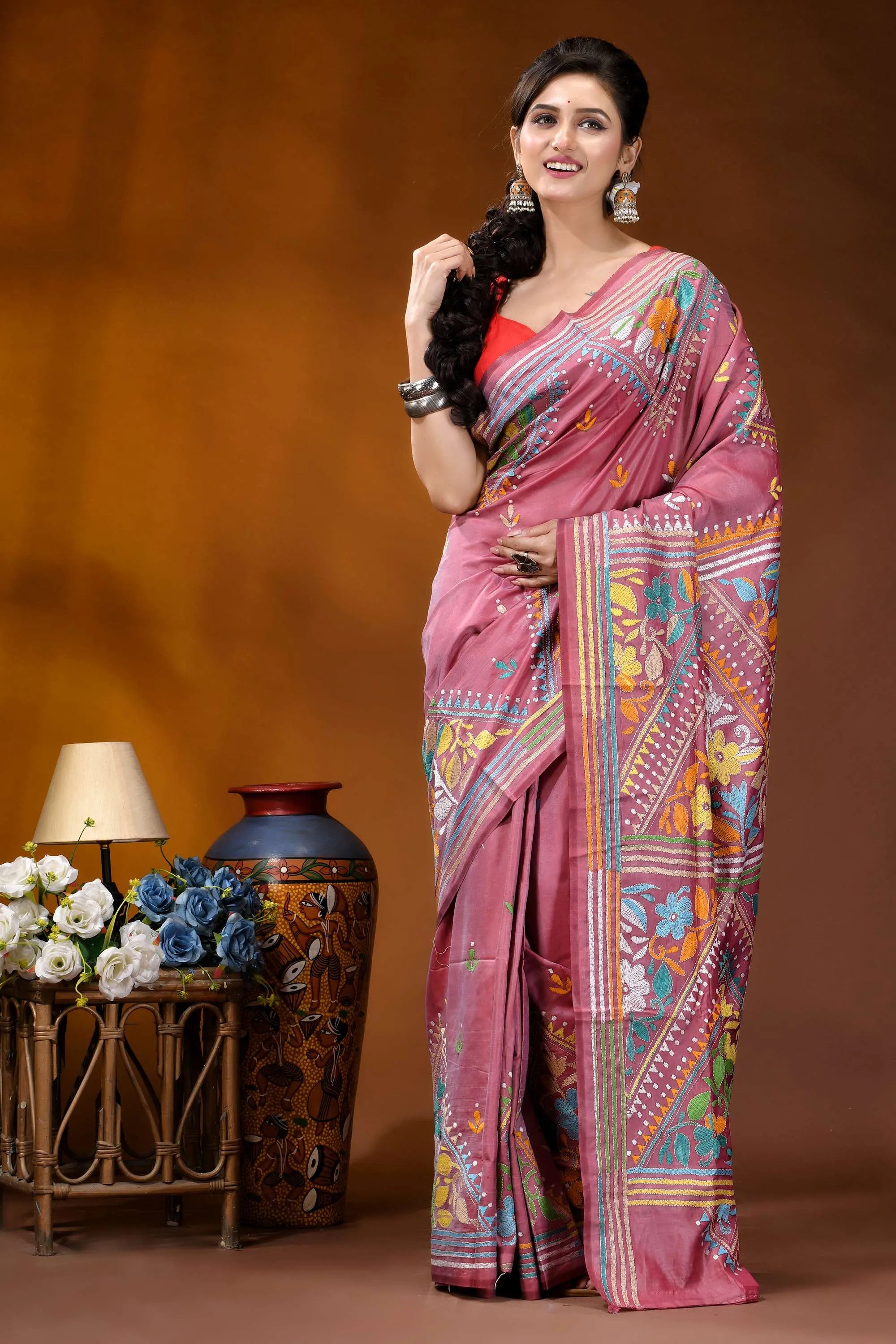 Hand embroidered floral motif silk kantha stitch saree in tulip pink woman wears vibrant pink saree 6
