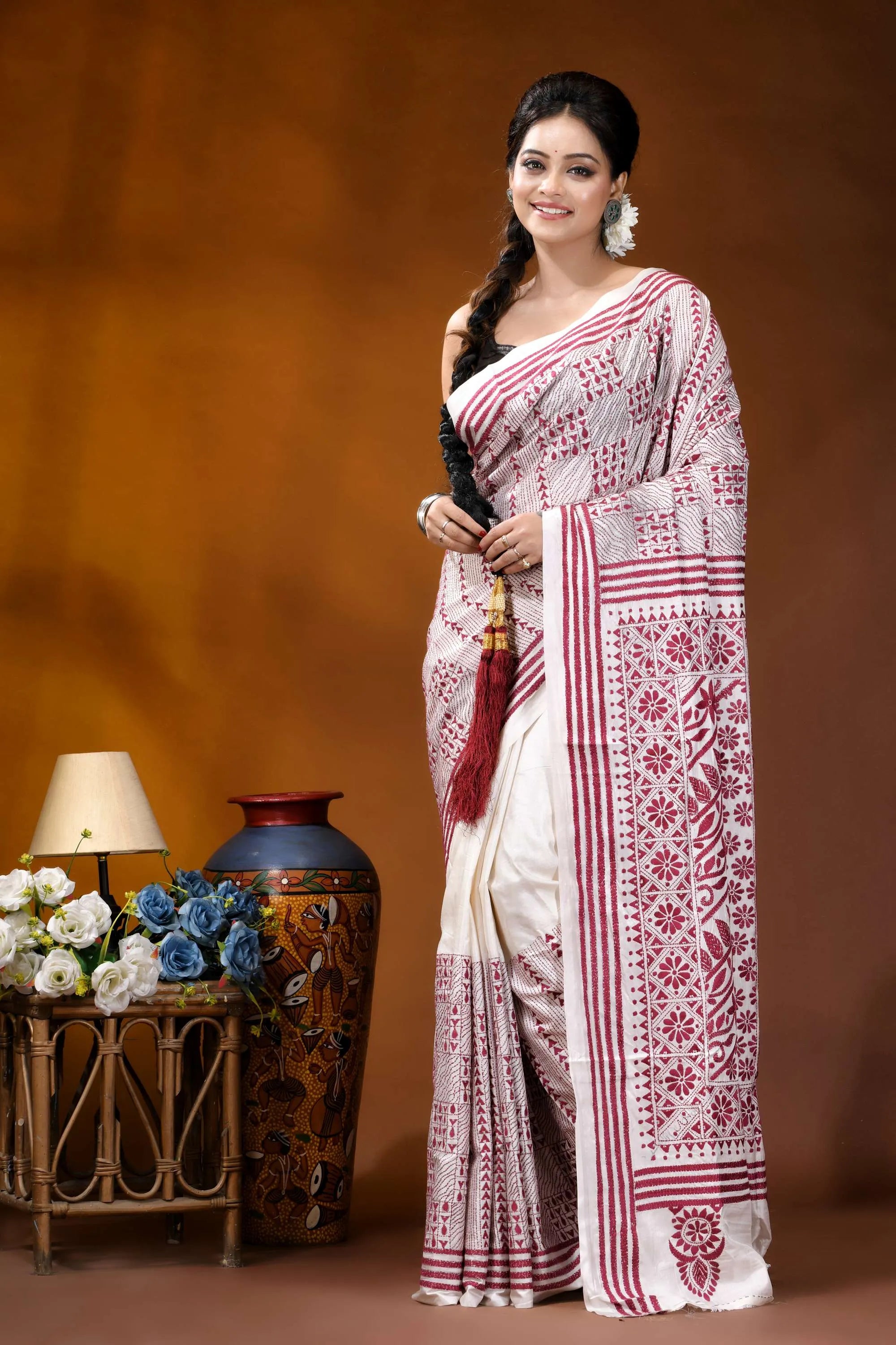 Hand embroidered white maroon floral design kantha silk saree woman wears white maroon patterned 6