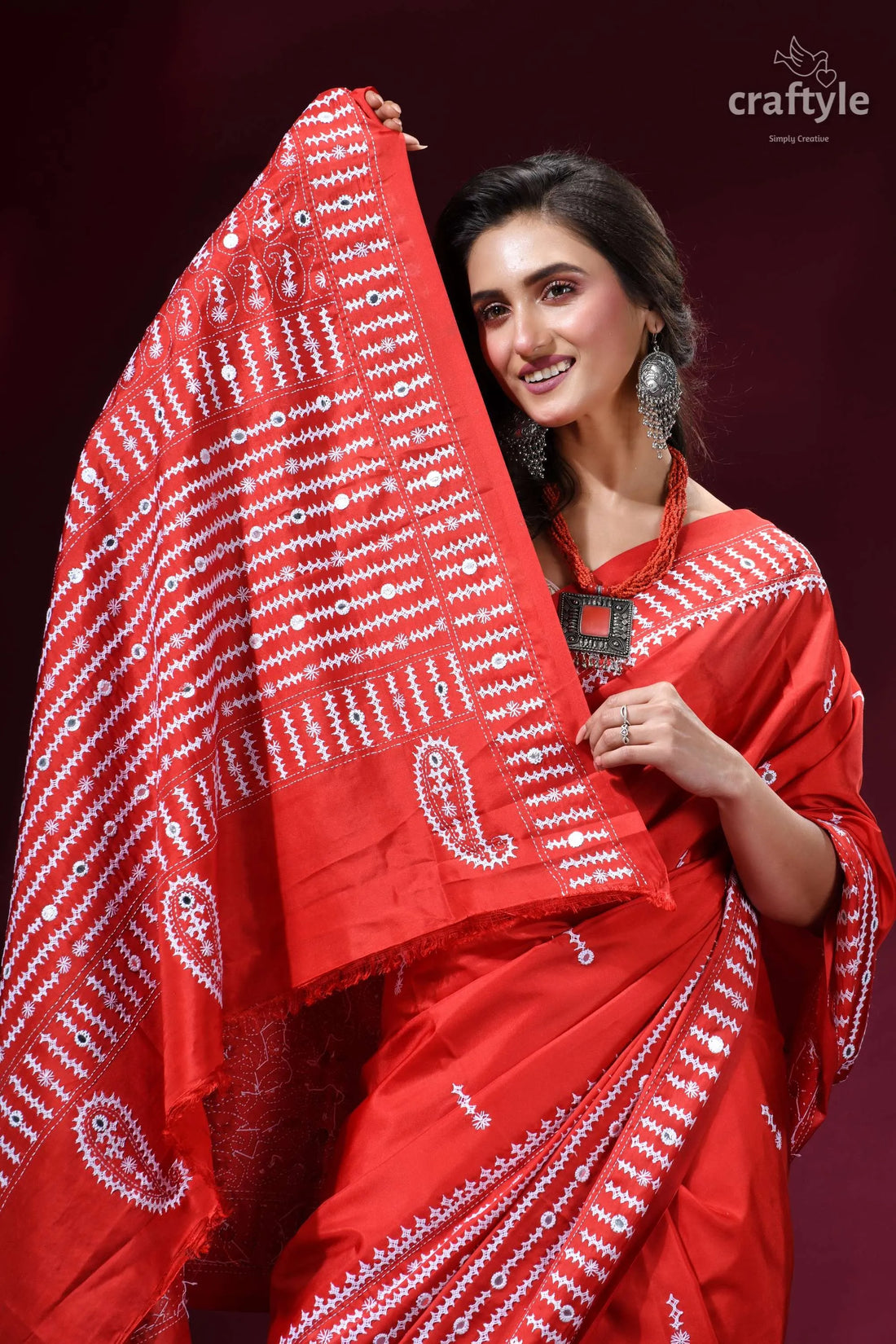 Hand kutch embroidered silk saree in lava red - mirror detailing vibrant red saree intricate white 2