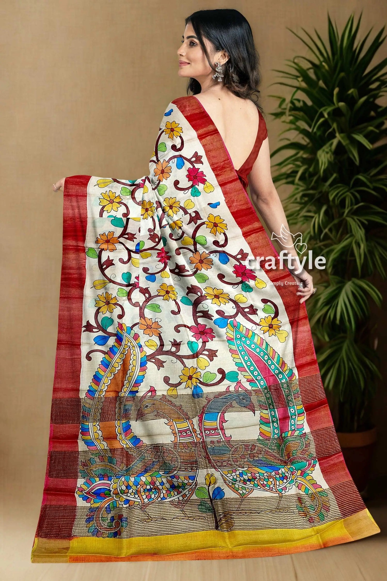 Hand painted floral tussar kalamkari saree with zari border - pure silk floral peacock-patterned saree 3