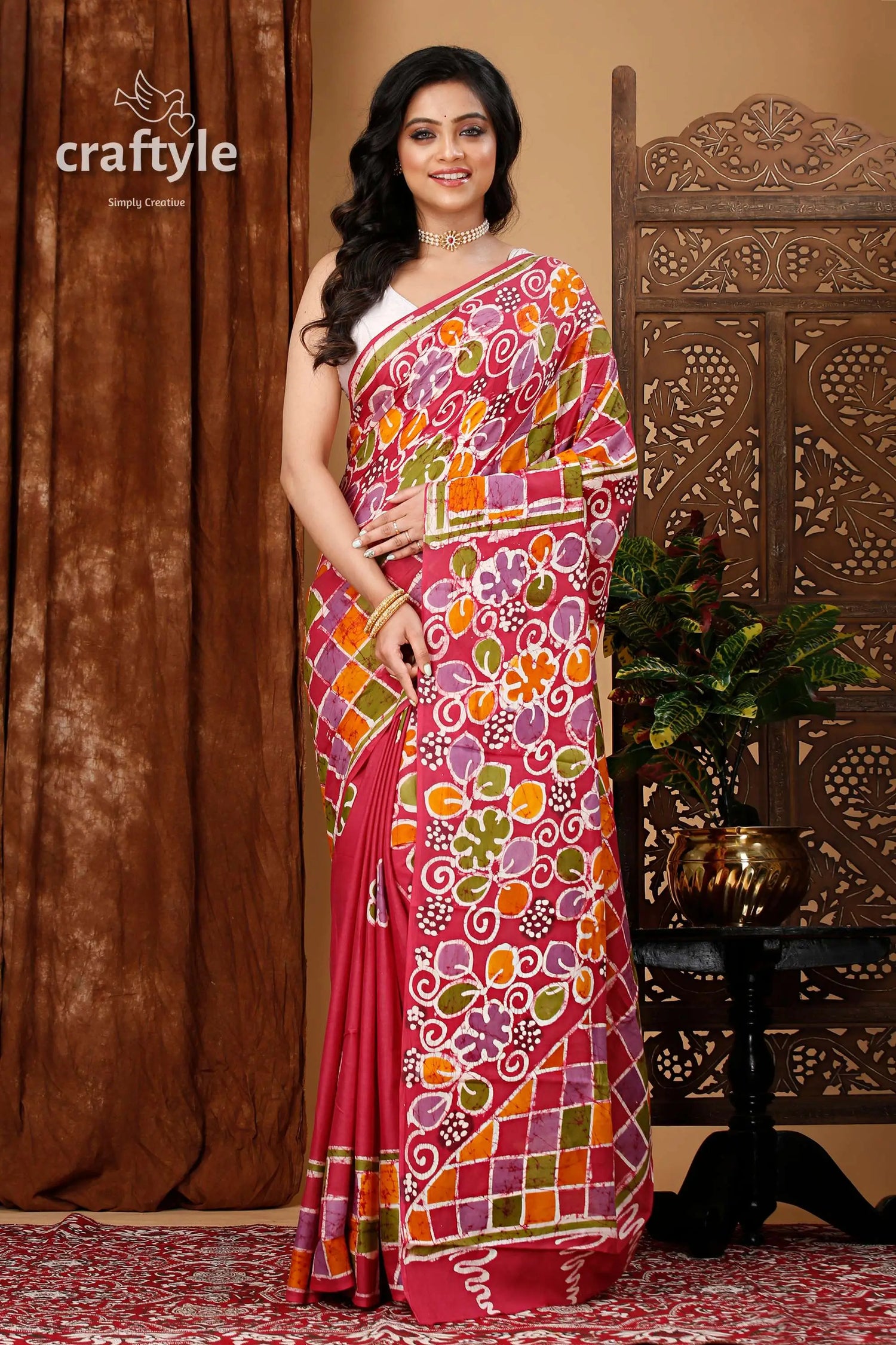 Hand painted pure cotton batik saree with floral artwork woman pink floral geometric patterned 1