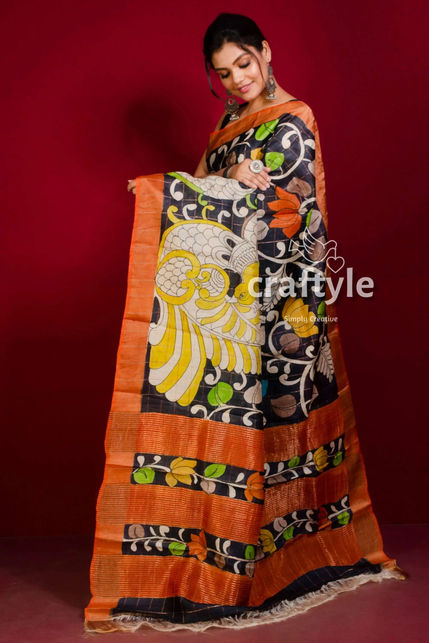 Hand painted pure tussar kalamkari saree with zari border - yellow black woman black orange saree peacock 3
