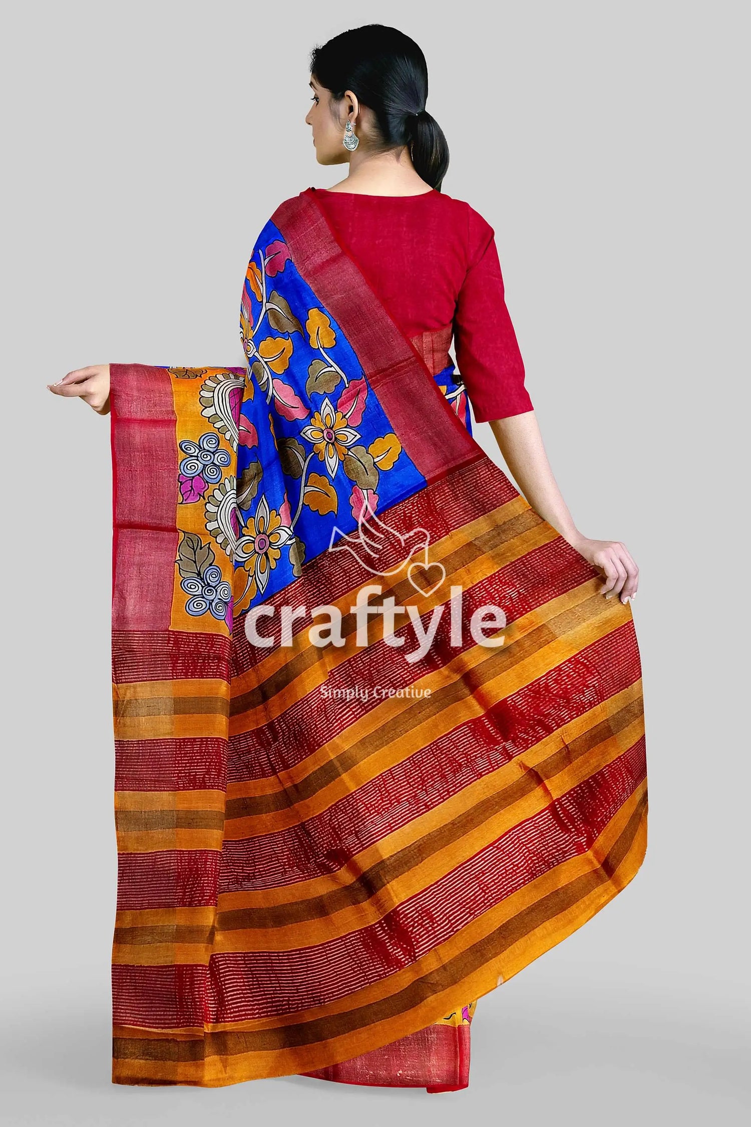 Hand-painted red and blue pure tussar kalamkari saree with zari border colorful floral-patterned saree 5