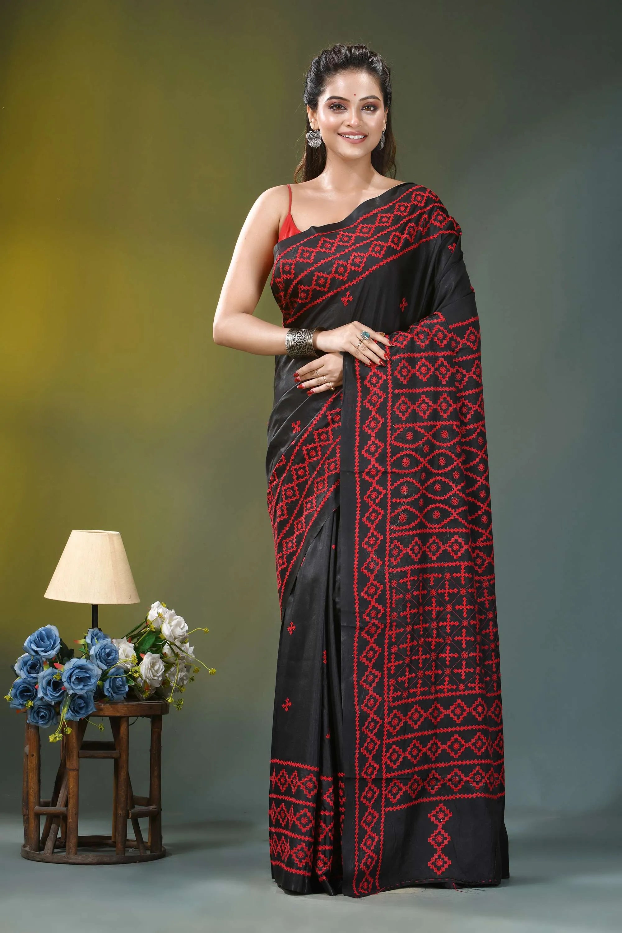 Handcrafted red thread kutch embroidery silk saree in black black saree intricate red embroidery 1