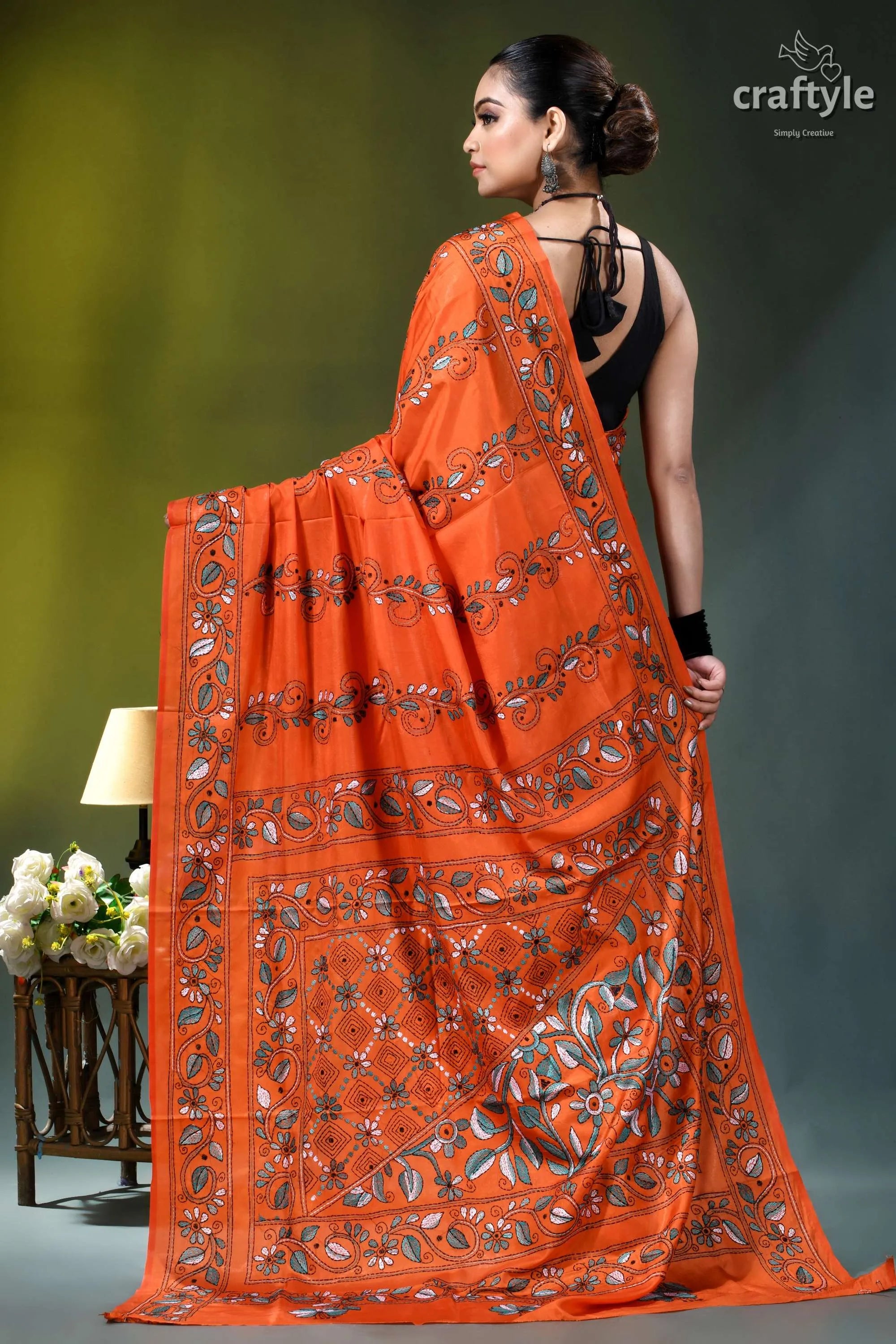 Handcrafted reddish orange floral design silk kantha saree vibrant orange saree intricate black 5