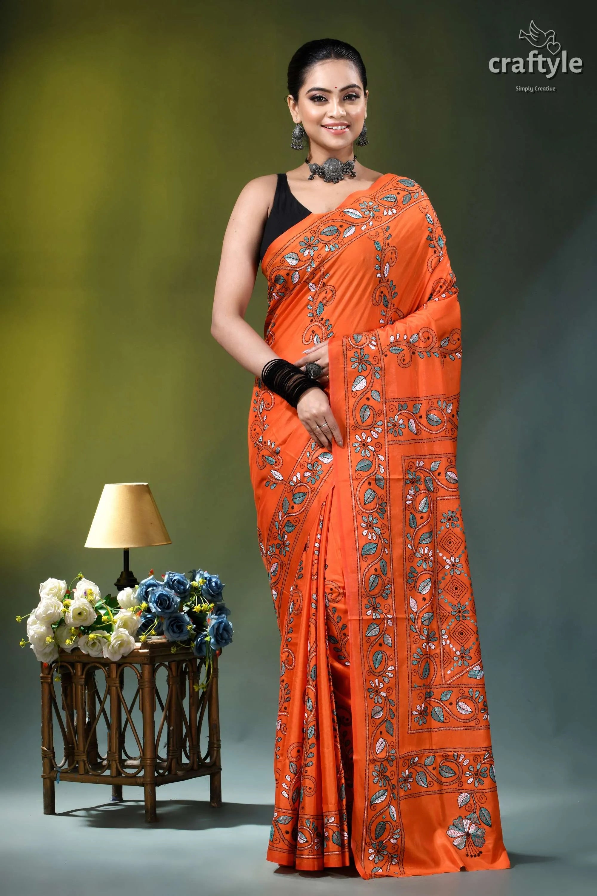 Handcrafted reddish orange floral design silk kantha saree vibrant orange saree intricate embroidered 1