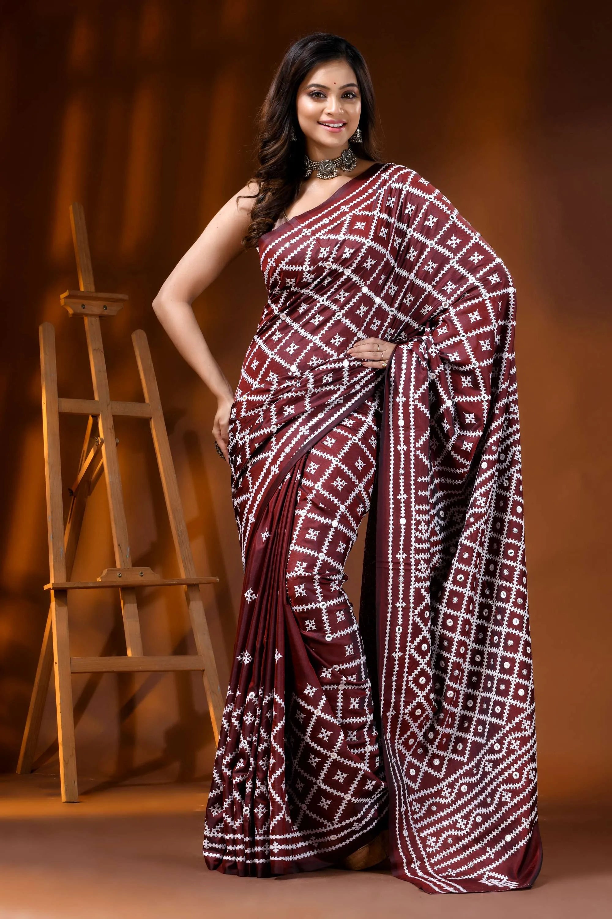 Handcrafted wine kutch embroidered silk saree with mirror detailing 1