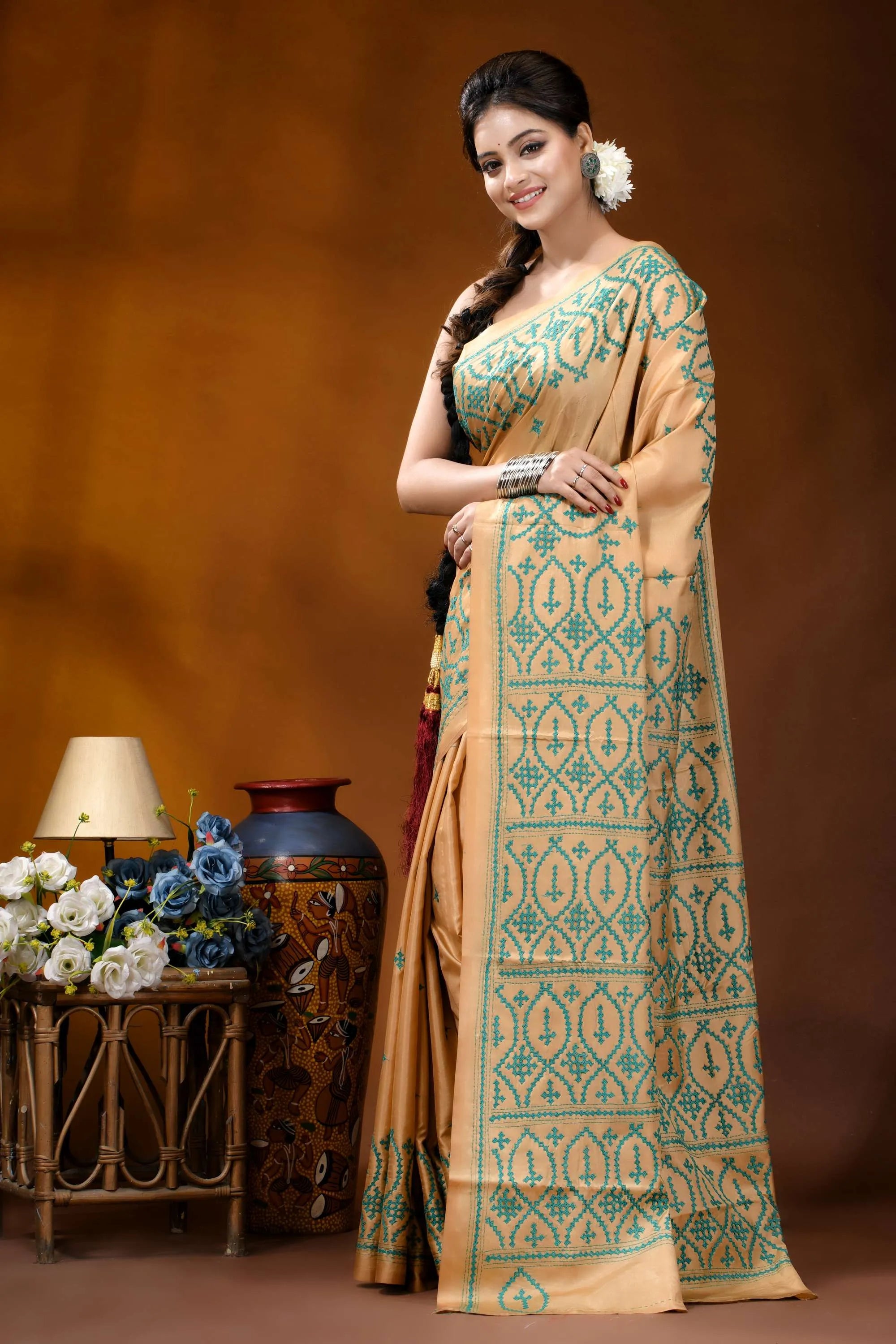 Handmade beige geometric design kutch embroidery silk saree woman wears beige saree intricate 3