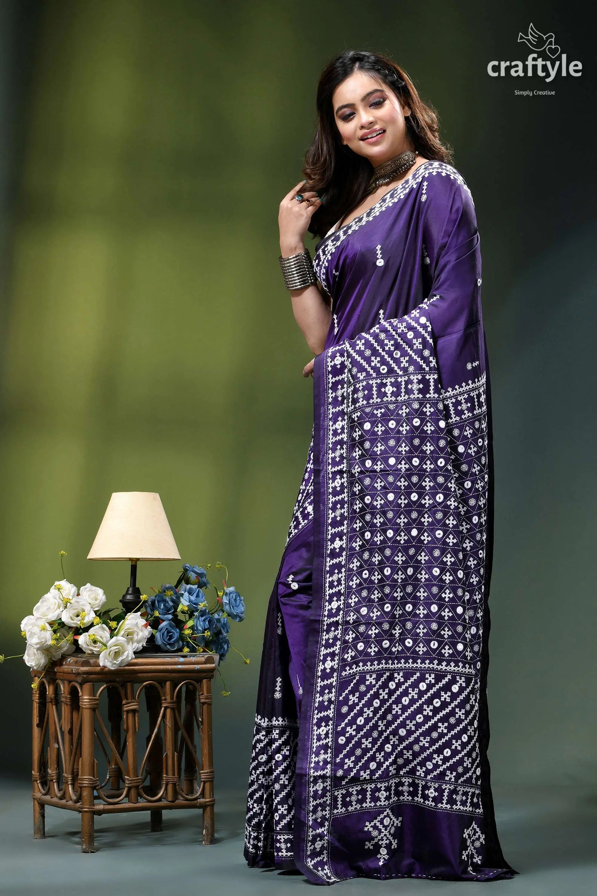 Jacarta blue intricate gujrati stitched silk saree with mirror work woman wears deep purple saree 3