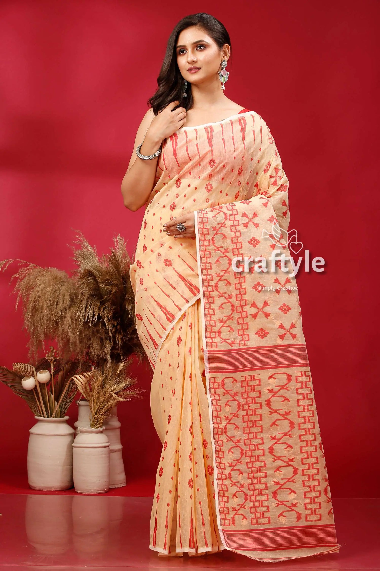 Light cream and red traditional dhakai jamdani saree peach-colored saree red geometric patterns 1