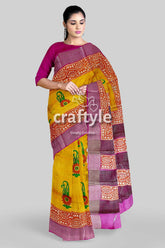 Lightning yellow hand block print pure tussar saree with zari border yellow purple patterned saree 1