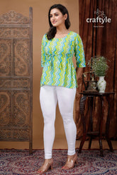 Lime green and sky cotton printed top with three quarter sleeves woman green white patterned leggings 3