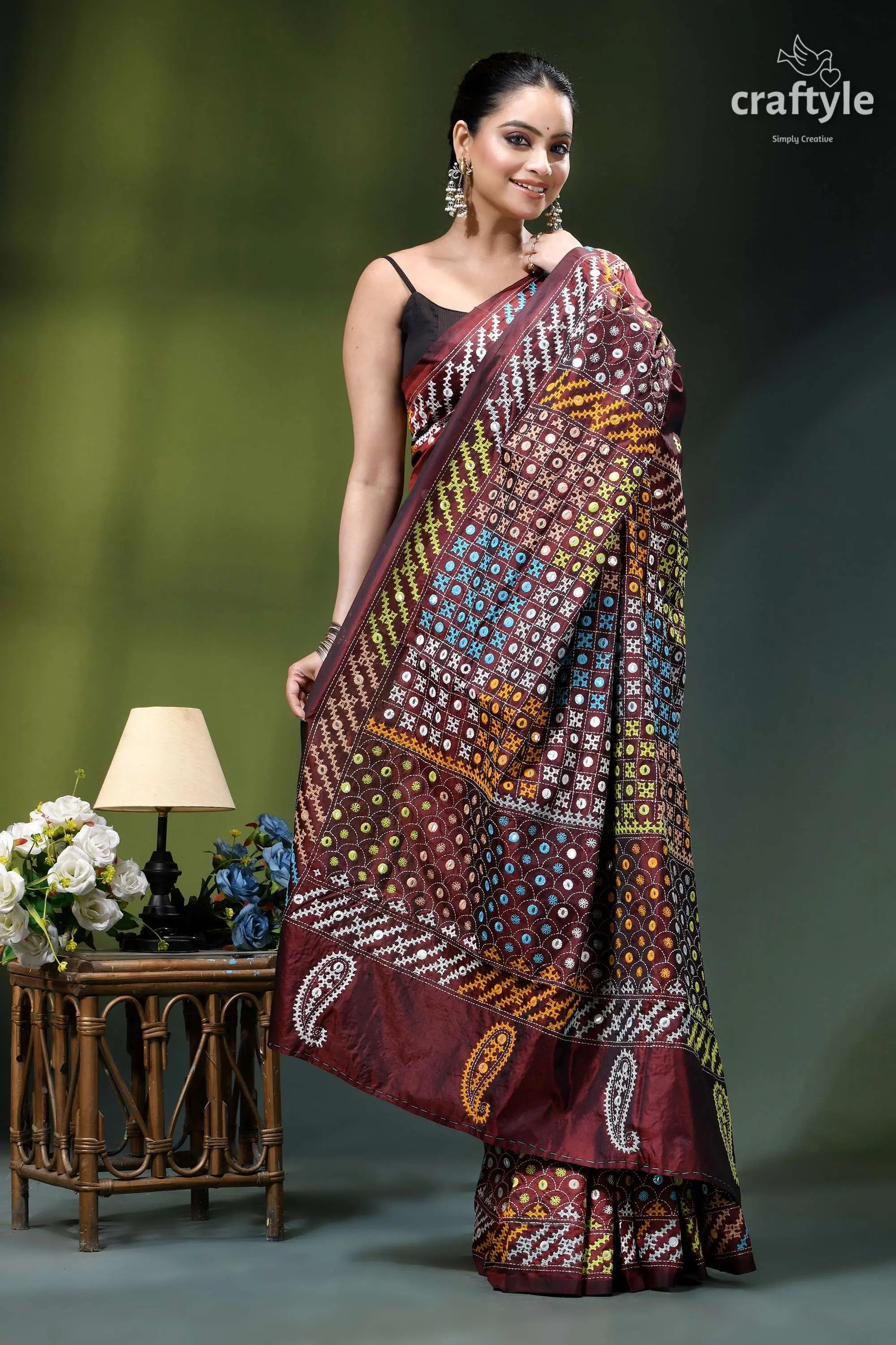 Livid brown multicolor gujrati stitched silk saree with mirror detailing maroon gold patterned saree intricate 5
