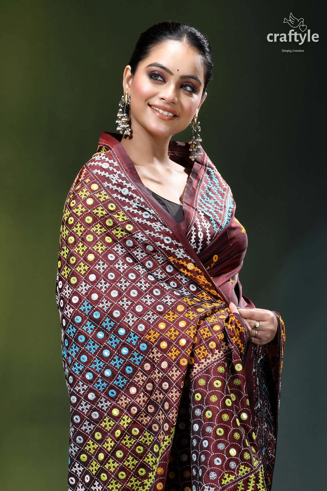 Livid brown multicolor gujrati stitched silk saree with mirror detailing maroon gold patterned saree intricate 2