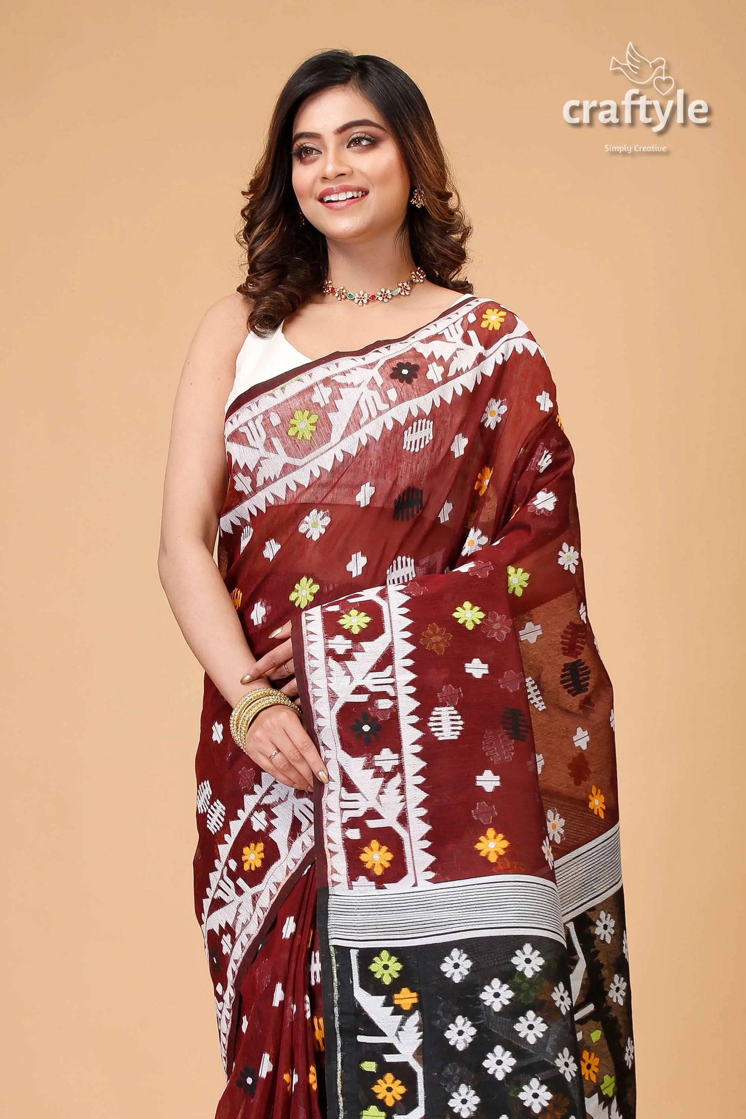Livid brown timeless jamdani saree maroon black floral patterned saree 2